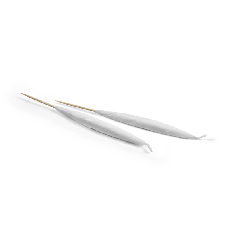 Premium Photo Closeup of lit candles