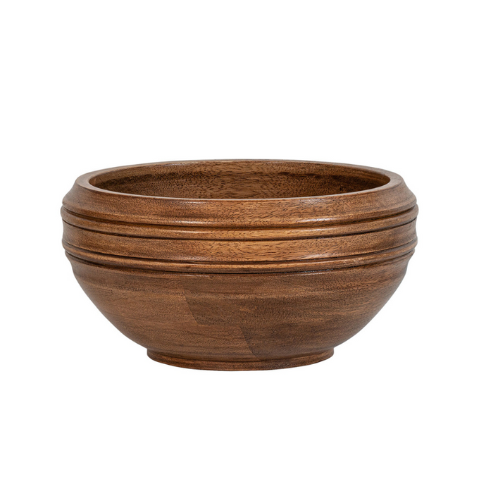 Hand-turned from beautiful Mango wood, this artisanal serving bowl brings casual elegance and warmth to any countertop or table. Filled with crusty bread, roasted vegetables from the garden, or found treasures post-hike (pinecones, heart-shaped rocks, acorns and such) its uses are endless.  Measurements: 10.0