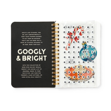 Load image into Gallery viewer, Open notebook with decorative stickers on a white background
